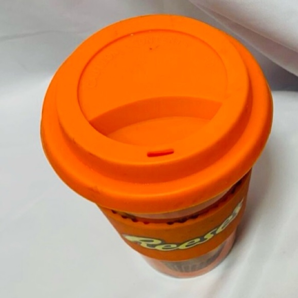 Reese’s Pieces Ceramic Travel Mug Orange Silicone Lid Protective Sleeve NWOT - Picture 6 of 7